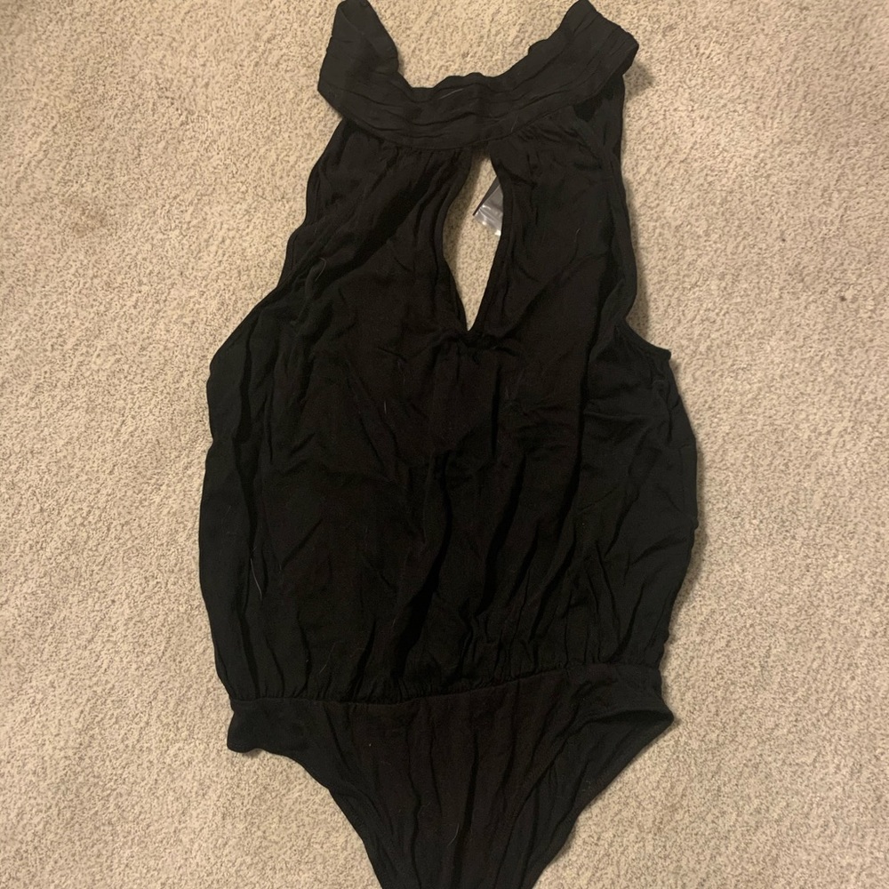 Still has tags! Body suit